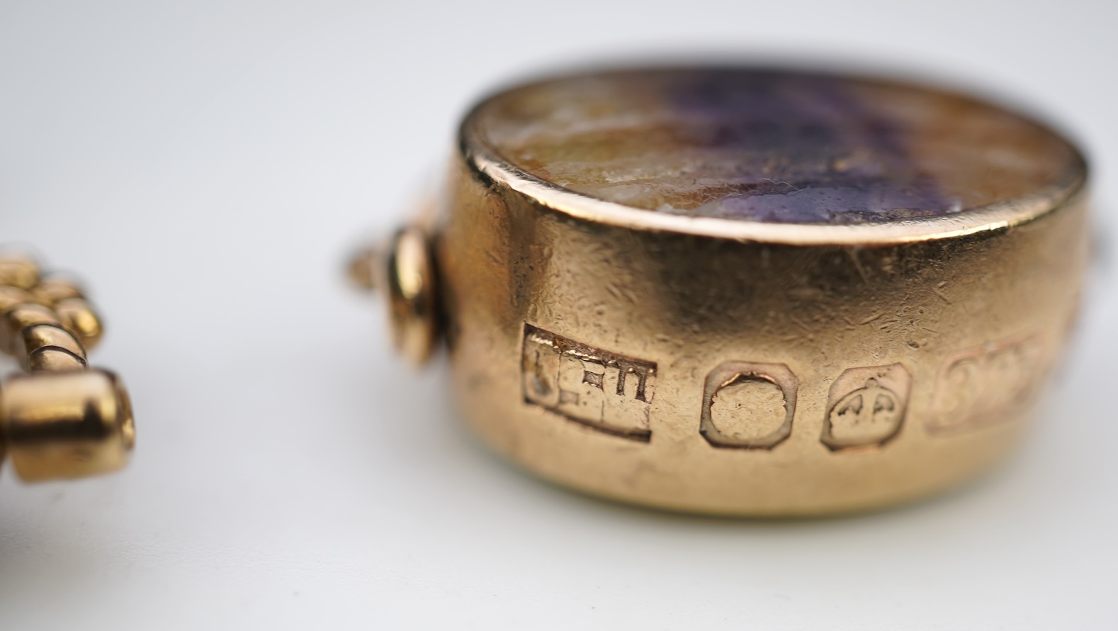 Three 9ct gold fob pendants
